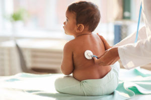 Toddler being examine by the pediatrician