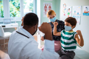 Pediatrician talking to patient