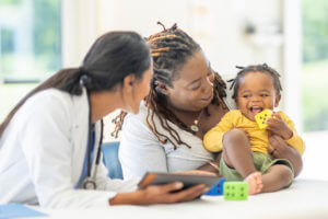 Mother with her Son at the Doctors