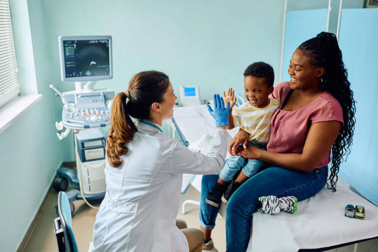 High-five for being such a brave little boy with pediatrician